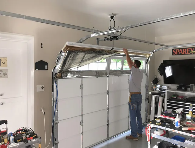 Garage door section replacement by Whitehall Garage Door Repair in Whitehall