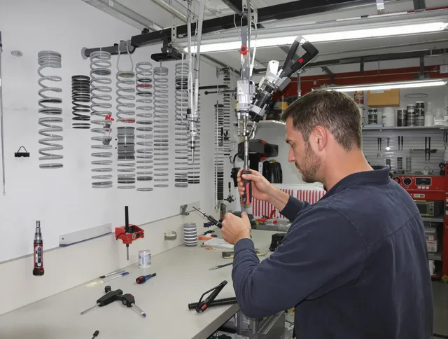 Whitehall Garage Door Repair safety certified technician performing precision spring replacement in Whitehall